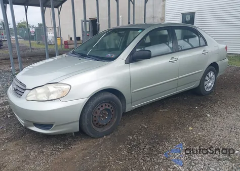 2003 Toyota Corolla Le z USA, uszkodzony, nr VIN JTDBR32EX30047579